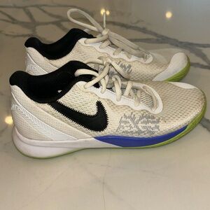 Gently used Nike Kyrie boys sneakers white black lime green and purple size 2.5